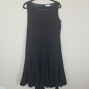Calvin Klein dress pleats and swing look